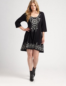 Pretty embroidery adds whimsy to this cotton shift dress with a modern hi-lo hem.U-neckElbow-length sleevesHi-lo hemAbout 36 from natural waistCottonMachine washImported