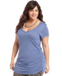 A key layering piece for the season: American Rag's short sleeve plus size tunic top, finished by a ruched hem.