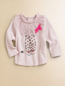 A beautiful, ballerina-inspired top with tutu neckline, back buttons and dancer legs print.Crewneck with tutuLong sleevesBack buttons56% cotton/40% modal/4% elastaneMachine washImported Please note: Number of buttons may vary depending on size ordered. 