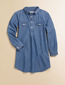 A go-with-anything wardrobe essential, the denim chambray shirt dress is classic and cool with signature embroidery in a snap-front design.Shirt collarLong sleeves with roll-tab snap cuffsSnap-frontFront snap-flap pocketsBack yokeShirttail hemCottonMachine washImported Please note: Number of snaps may vary depending on size ordered. 