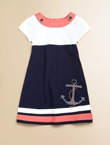 Set sail for this gorgeous, sailor-inspired frock in a classic a-line silhouette with anchor appliqué.Boatneck with button detailShort sleevesBack buttonsA-lineStriped hemCottonMachine washImported Please note: Number of buttons may vary depending on size ordered. 