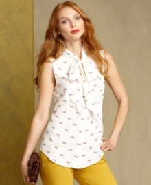 This too-cute top from Tommy Hilfiger features a trendy bow-tie at the neckline and chic basset hound print for preppy panache.