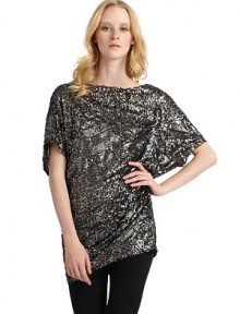 THE LOOKAllover sequinsDolman sleevesBack cutoutPullover styleTHE FITAbout 29 from shoulder to hemTHE MATERIALPolyesterFully linedCARE & ORIGINDry cleanImportedModel shown is 5'10½ (179cm) wearing US size Small. 