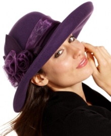 Add a little romance to your everyday accessorizing with this fabulous felt hat from August. The feminine silhouette is accented with tonal ribbon and exquisite floral detail.