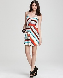 This Volcom dress embraces sunny-season style with vibrant stripes and a breezy silhouette.