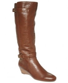 An awesome wedge heel adds a bit of height to Bandolino's Alva-W wide calf tall boots.