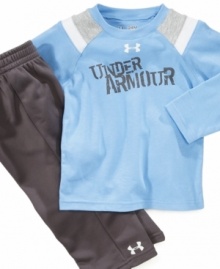 He'll score big points in this cute football style tee and pants set by Under Armour.