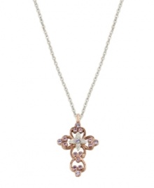 Express your faith with subtle, feminine flair. Vatican pendant features an intricate, scrolling cross highlighted with beautiful violet crystals. Setting and chain crafted in silver tone and rose gold tone mixed metal. Approximate length: 24 inches. Approximate drop: 1-1/4 inches.