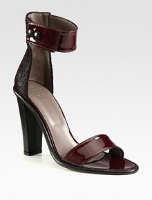 A dramatic ankle strap silhouette pairing glossy patent leather with lush calf hair for a luxe effect. Leather-covered heel, 4¾ (120mm)Patent leather and calf hair upperPatent leather ankle strap with double snap closuresLeather lining and solePadded insoleMade in Italy