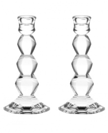 Vera Wang's architecturally inspired Orient candlesticks embody elegance in fine crystal with bold faceted cuts reminiscent of the designer's classic bridal jewelry.