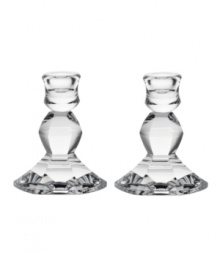 Vera Wang's architecturally inspired Orient candlesticks embody elegance in fine crystal with bold faceted cuts reminiscent of the designer's classic bridal jewelry.