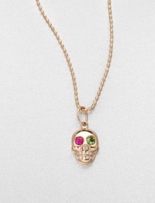 From the Edge Collection. A 14k rose gold skull with ruby and green garnet eyes on a ball chain. 14k rose goldRuby and green garnetLength, about 16Pendant size, about .4 Lobster clasp closureMade in Italy and imported