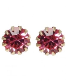 Hot pink! Perenially fashionable and feminine, a pretty pink hue stands out on these round faceted crystal stud earrings from Betsey Johnson. Crafted in antique gold tone mixed metal, they're a stylish solution for mixing and matching with your favorite outfits. Approximate diameter: 1/3 inch.