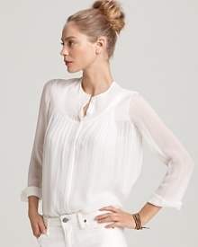 A sheer Vince pleated shirt adds an ethereal element to your 7-day collection, airy and easy for workdays and weekends alike. Pair it with white jeans for an early dinner out or tuck into trousers for office chic.