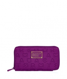 Detailed in durable neoprene with an allover logo print, Marc by Marc Jacobs zip-around wallet is a fun and covetable choice for stashing away your everyday essentials - Tonal logo plaque, zip-around closure, zippered change purse, multiple credit card slots - Carry alone for running quick errands, or slip into a brightly printed handbag