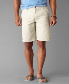 Update your warm-weather wardrobe with easy-wear flat-front shorts from Dockers.