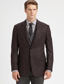 Richly textured wool shapes and defines this modern-fitting sportcoat.Two-button frontNotched LapelChest welt, waist flap pocketsSide ventsWoolDry cleanItaly