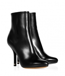 Exquisitely styled with a sleek, streamlined finish, Givenchys jet back leather ankle boots guarantee a flawless polish to your look - Softly pointed toe, hidden inside zip, stiletto heel with metal insert - Pair with minimalist separates and ultra luxe outerwear