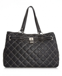 Quilted to perfection. Add a sophisticated appeal to your look with a gorgeous quilted shopper with room for all your necessities. This eye-catching design by Nine West features shiny silvertone hardware and a lock charm at front.