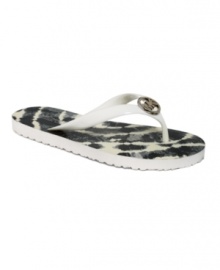 Tie-dyed flip flops are always fun. MICHAEL by Michael Kors' MK flip flops feature a metallic brand logo on the vamp.