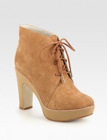 Lace-up silhouette of buttery suede, propped with a sturdy heel and platform for a casual-cool look. Foam heel, 4 (100mm)Foam platform, 1 (25mm)Compares to a 3 heel (75mm)Suede upperLeather lining and solePadded insoleImported