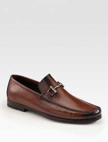 Equestrian-inspired bit defines this Italian leather loafer. Suede upperLeather liningPadded insoleRubber soleMade in Italy