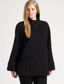 Taking a cue from vintage Hollywood glamour, a gorgeous swing coat with chic knit details and convenient slash pockets.Oversized collarLong sleevesConcealed button frontSlash pocketsRibbed-knit trimFully linedAbout 28 from shoulder to hem60% wool/20% cashmere/20% nylonDry cleanMade in Italy