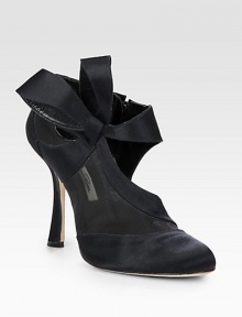 An asymmetrical bow defines this satin design with semi-sheer mesh and daring cutouts. Self-covered heel, 4½ (115mm)Satin and mesh upperSide zipLeather lining and solePadded insoleMade in Italy