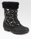 Lined with plush shearling, this lace-up essential combines quilted canvas and rich suede for a textured look. Shaft, 8Leg circumference, 11Coated canvas and suede upper with shearling trimSide zipShearling liningRubber trek solePadded insoleImported