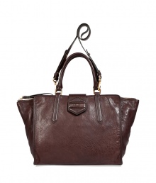 Rich, dark brown bag in soft cow and lamb leather - Designed in a trendy and functional shopper shape - Features short handle and a long, adjustable strap option - Gold-colored hardware - Top zipper closure - Beautiful, high-quality design upgrades business and leisure looks