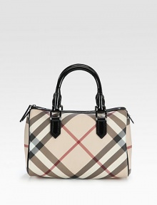 Signature Burberry check defines this roomy design rendered in durable PVC with chic contrast trim.Double top handles, 5 drop Top zip closure One inside zip pocket Nylon lining 11W X 8H X 6D PVC Imported