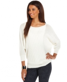 Mixed knit creates a textural look and feel to DKNY jeans' cozy sweater.