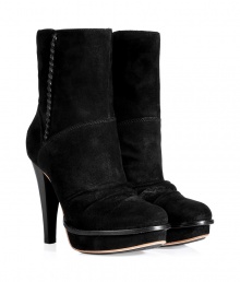 Inject urban attitude into your look with UGG Australias jet black suede ankle boots, an ultra cool choice perfect for taking from day into night - Rounded toe, gathered front detail, inside zip, stitched welt, covered platform, stacked heel - Hits above the ankle - Wear with favorite skinnies, cool modern knits, and matching black accessories