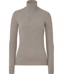 Dream sweater for fall and winter, this stone-grey cashmere sweater can be worn for almost every occasion - Feminine turtleneck flatters the figure, creating a clean silhouette - Long sleeves and a wide, moderately-long hem - An indispensable basic, it pairs nicely with jeans or corduroy pants for leisure, or with a pencil skirt and trousers at the office