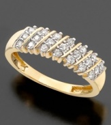 Bountiful round-cut diamonds (1/5 ct. t.w.) lie in seven rows of continuous beauty on this gorgeous 14k gold ring.