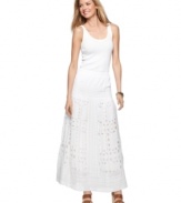 Oversized eyelet modernizes the delicate fabric on this MICHAEL Michael Kors maxi skirt for a look that's more fashion-forward than traditionally feminine!