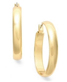 Rock timeless hoops this season. Charter Club's classic earring style flaunts a large band silhouette. Crafted in gold tone mixed metal. Approximate drop: 3/4 inch.