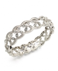 Encrusted with glittering glass accents, Charter Club's bracelet will add a decorative detail to your outfit either for day or evening. The stretch design lets you slip it on and off effortlessly. Crafted in silver tone mixed metal. Approximate diameter: 2-1/4 inches.