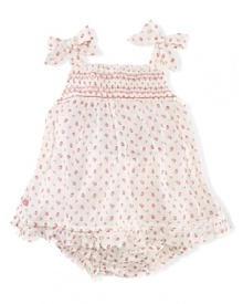 Rendered in airy cotton voile, an adorable trapeze dress is accented with a tiny floral print and a playful smocked neckline for a timeless look imbued with charming details.