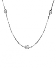 A fine line. CRISLU's delicate long necklace features inch upon inch of bezel-set round-cut cubic zirconias (4-3/4 ct. t.w.). Set in platinum-plated sterling silver. Approximate length: 48 inches + 2-inch extender.