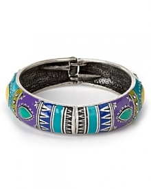 Add a dash of bohemian luxe with this multi colored enamel bangle from Aqua. Boasting a bold geometric pattern, this bracelet stands out as part of an eclectic stack.