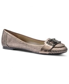 Croc leather gives the Brenna flats by Isola an intriguing look. Contrasting metallic trim along the edges and matching hardware at the toe adds even more flair.