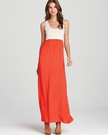 Whether dressed up with sky-high heels or laid-back with sleek sandals, this two-tone Splendid maxi dress epitomizes vibrant summer style.