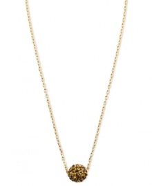 Where there's smoky style, there's red-hot fashion. Anne Klein's pendant necklace radiates heat with a fireball embellished with topaz crystals. Crafted in gold tone mixed metal. Approximate length: 16 inches + 2-inch extender.