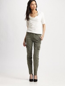 Cargo pockets and zipper details employ utilitarian chic to this slim silhouette.THE FITFitted through hips and thighsRise, about 8Inseam, about 28THE DETAILSZip flyFive-pocket style98% cotton/2% LycraMachine washMade in USA of imported fabricModel shown is 5'10 (177cm) wearing US size 4.