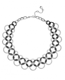 Slip into something a little dramatic. Monet's intricate necklace combines three rows of links in silver tone and hematite-plated mixed metal. Approximate length: 17 inches + 2-inch extender.