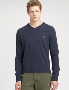 Classic-fit sweater shaped in pure lambswool with contrasting donegal details, accented with embroidered penguin detail at the chest.V-neckRibbed knit collar, cuffs and hemLambswoolDry cleanImported