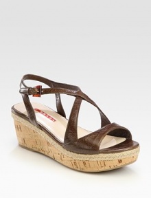 EXCLUSIVELY AT SAKS. Leather criss-cross design with cork wedge and espadrille detail. Cork and hemp-covered wedge, 2 (50mm)Cork and hemp-covered platform, 1 (25mm)Compares to a 1 heel (25mm)Leather upperLeather liningRubber solePadded insoleImportedOUR FIT MODEL RECOMMENDS ordering true size. 