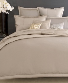 A simple design is transformed into fanciful sophistication with this Modern Classics Platinum Ash duvet cover from Donna Karan, featuring lush texture in a soothing colorway. Finished with silk trim. Button closure.