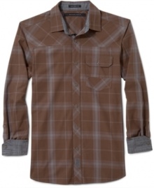 Sean John dresses up the down-home plaid with a tonal check, contrast cuffs, front yoke, and single button-flap pocket.